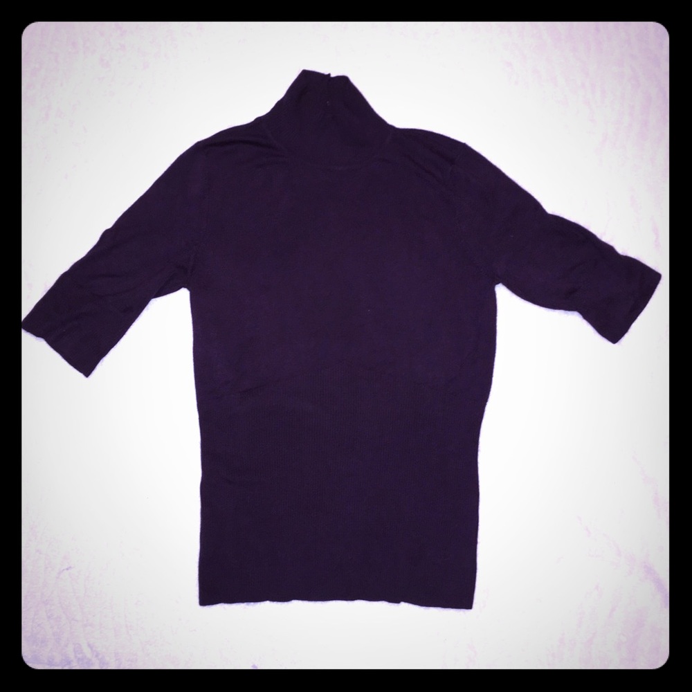 Short sleeve turtleneck sweater with back cut-out